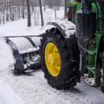 big-special-tractor-is-removing-snow-from-forestal-road big-special-tractor-is-removing-snow-from-forestal-road
